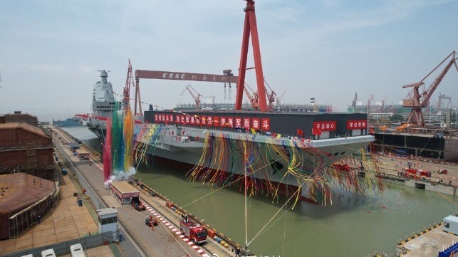 China's naval buildup is subsidized by foreign orders, with warships constructed in the same docks with the same trained workforce (file image courtesy CSSC)