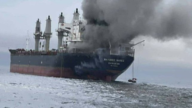 abandoned ship drifting on fire in Persian Gulf