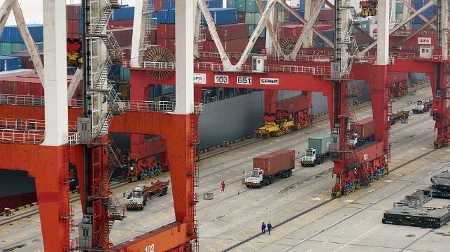 Cargo operations at the busy port of Shanghai Yangshan (file image courtesy Bruno Corbet / CC BY SA 3.0)
