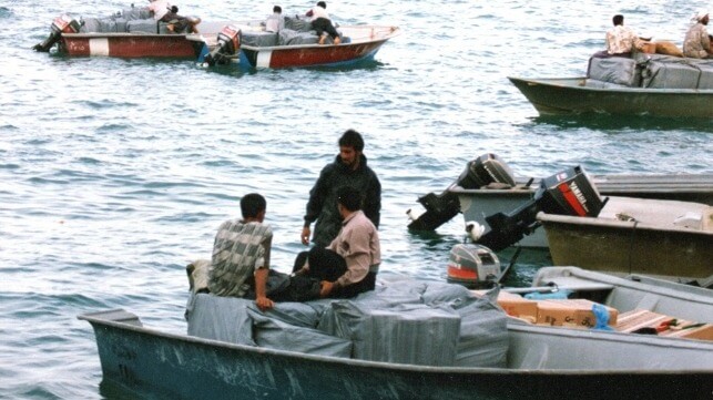 Waiting for dusk: trader speedboats loaded up for the return journey to Iran (©CJRC)